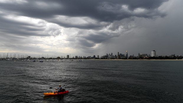 A storm rolls in over the city, as seen from St Kilda Pier.