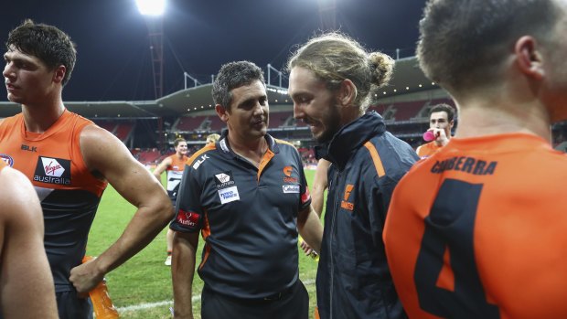 Good times: Giants Coach Leon Cameron speaks to Matthew Buntine after the match.