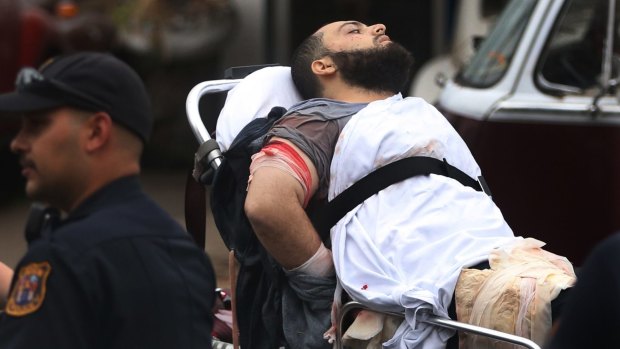 Ahmad Khan Rahami is taken into custody after a shootout with police in New Jersey.