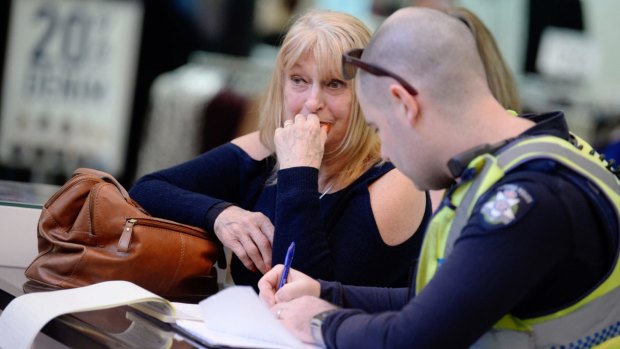 Police interview witnesses at Waverley Gardens shopping centre.