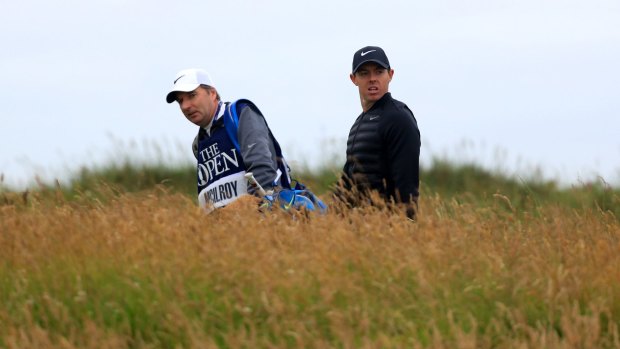 A day to forget: Rory McIlroy walks off the third tee during the third round of the 145th Open Championship at Royal Troon.