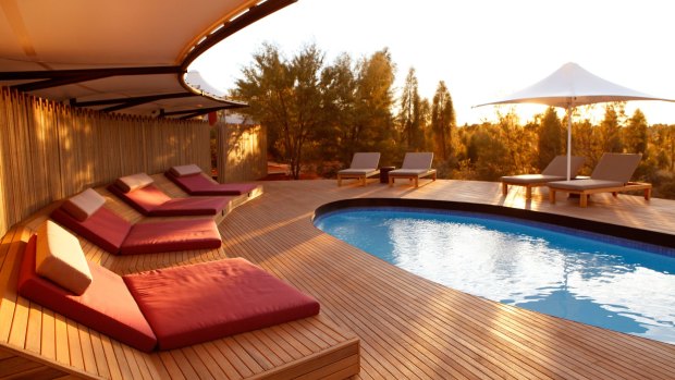 Daybeds by the pool of Longitude 131°.