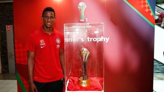 Worth having: The Wanderers’ Golgol Mebrahtu and the Club World Cup trophy on Thursday.