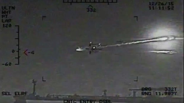 The US Navy says the video shows a rocket fired from an Iranian Revolutionary Guard vessel near warships and commercial traffic in the strategic strait.