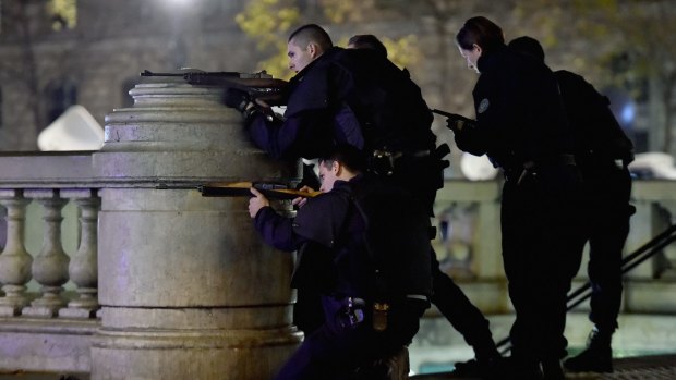 Armed police are deployed in Paris at the Place de la Republique.