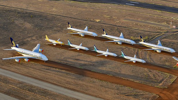 Grounded Singapore Airlines and Scoot planes at Asia Pacific Aircraft Storage near Alice Springs.