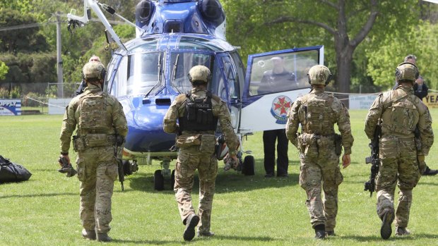 Special Operations Group officers involved in the hunt for the fugitives in Yea on Friday.