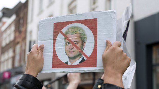 A protester shows his opposition to far-right Dutch politician Geert Wilders as he campaigns in Heerlen.
