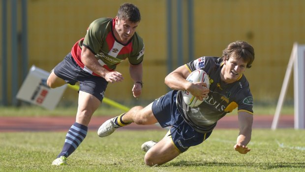 James Dargaville of the Brumbies on his way to scoring his try.