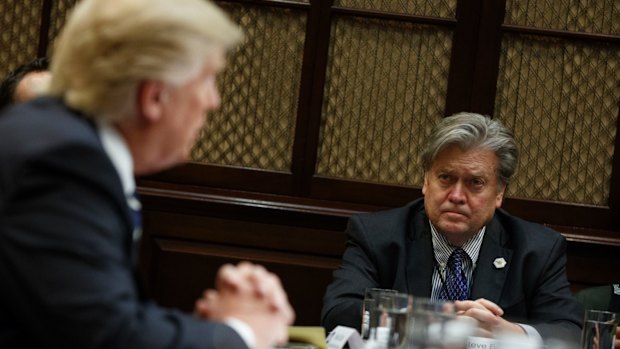 Hero to zero: Former White House chief strategist Steve Bannon listens as President Donald Trump speaks.