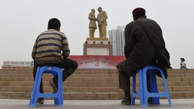 Uighurs watching a show in Hotan, in Xinjiang province last month.