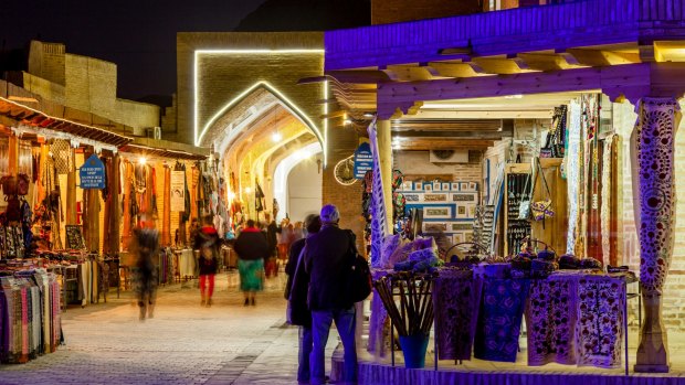 A bazaar comes alive at night in Bukhara, Uzbekistan.