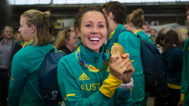 Pleased as punch: Chloe Esposito shows off her gold medal at Sydney Airport on Wednesday.