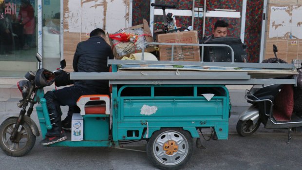 Tenants move out of Picun Village with all their belongings.