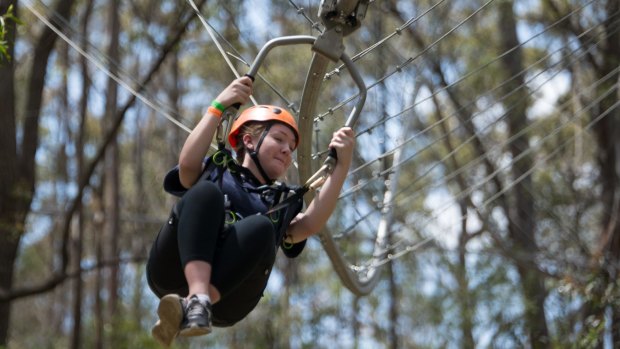 The 500-metre ride has riders skimming close to surrounding trees and branches. 