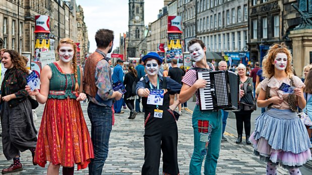 Street performance at Edinburgh Festival Fringe on the Royal Mile, Edinburgh.