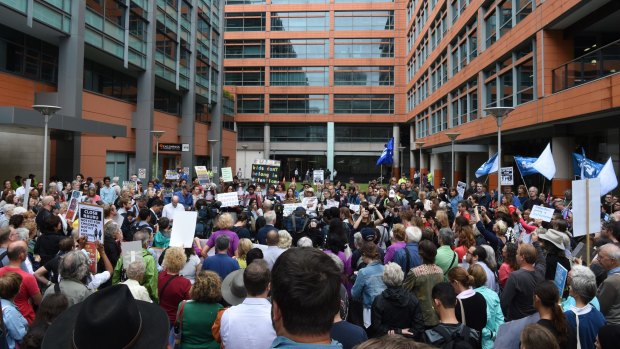 Hundreds protest in front of the Department of Immigration in Sydney.