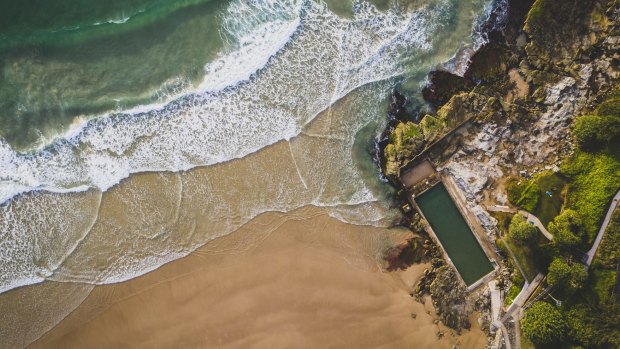 The beach and sea baths of Yamba Main Beach.