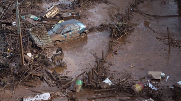The flood of mineral waste - some 32 million cubic metres of water - surged over hills and crashed through the valleys killing 19 people.