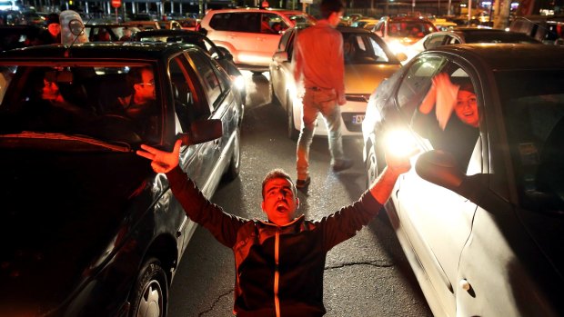 Iranians celebrate in Tehran after Iran's nuclear agreement was announced. 