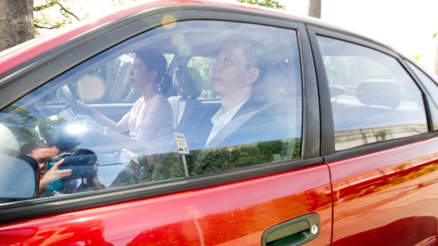 Robert Xie leaves Silverwater jail with his wife Kathy Lin on Friday.