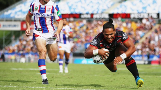 You can't touch this: Solomone Kata dives over to score a try during the round four NRL match between the New Zealand Warriors and the Newcastle Knights at Mt Smart Stadium.
