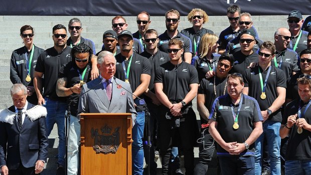 Prince Charles addresses a crowd at New Zealand's Parliament House in Wellington before the All Blacks celebration parade in the city on Friday.