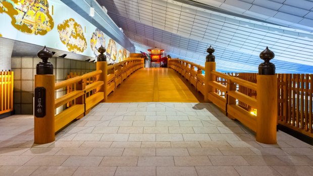The terminal features several nods to Tokyo's culture and history, including a miniature recreation of the wooden Nihonbashi Bridge.