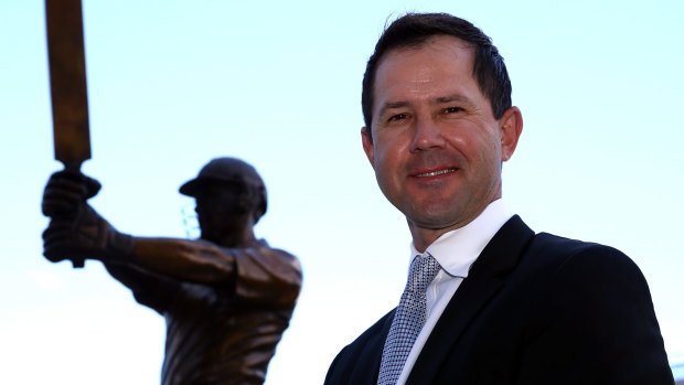 Immortal: Ricky Ponting poses with his statue at Blundstone Arena in Hobart, Tasmania.