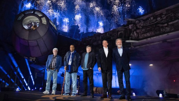 Star Wars creator George Lucas (left), actors Billy Dee Williams, Mark Hamill, Walt Disney Company Chairman and CEO Bob Iger and actor Harrison Ford celebrate the opening of Star Wars: Galaxy's Edge.