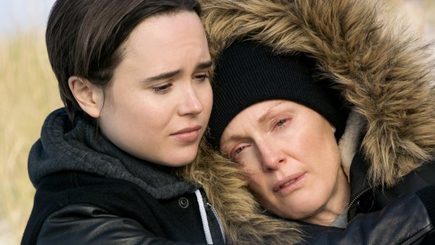 Stacie Andree (Ellen Page) and Laurel Hester (Julianne Moore) in a scene from <i>Freeheld</i>