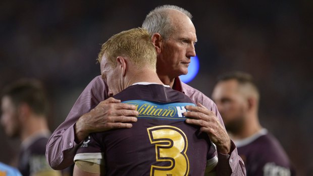 Gut wrenching: Wayne Bennett consoles Jack Reed after the grand final loss to the Cowboys.