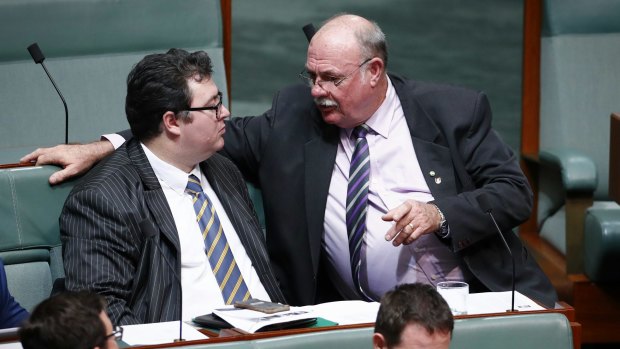 Nationals MP George Christensen and Warren Entsch during question time on Thursday.