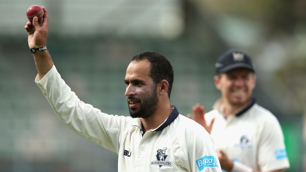 Ahmed celebrates his eight wickets during the Sheffield Shield final.