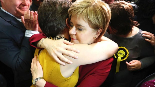 Scotland's First Minister Nicola Sturgeon (right) arrives at the vote count in the Emirates Arena in Glasgow.