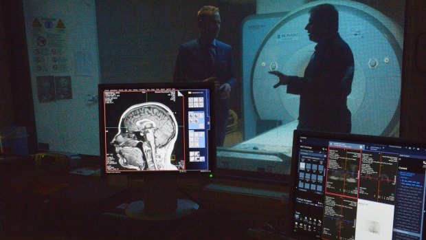 Research scientists Pascal Molenberghs, left, and Juan Dominguez, right, analysed MRI scan results  showing the effects of disagreement on people's brains.  