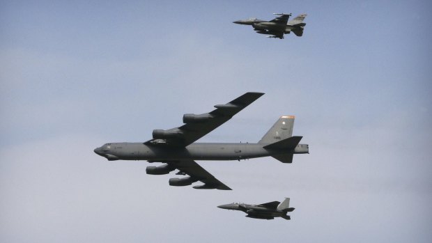 A US Air Force B-52 bomber flies over Osan Air Base in Pyeongtaek, South Korea, on Sunday. 