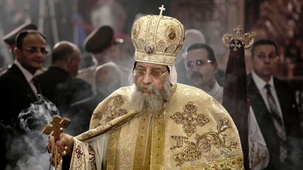 Egyptian Coptic Pope Tawadros II leads prayers during the Easter Eve service at St Mark's Cathedral in Cairo.