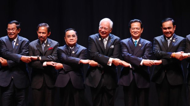 ASEAN leaders: from left, Cambodian Prime Minister Hun Sen, Brunei's Sultan Hassanal Bolkiah, Laos' PM Thongsing Thammavong, Malaysian PM Najib Razak, Vietnamese PM Nguyen Tan Dung and Thai PM Prayut Chan-o-cha.