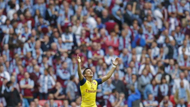 Alexis Sanchez celebrates after scoring Arsenal's second FA Cup final goal.