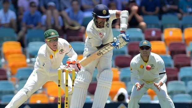 Centurion: Indian opener Murali Vijay plays to the leg side on his way to his ton on day one of the second Test in Brisbane.