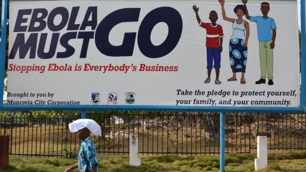 An ebola campaign banner with the new slogan "Ebola Must GO" in Monrovia, Liberia, in February this year.