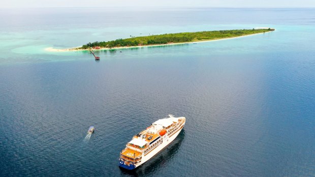 A Coral Expeditions cruise ship in Tinabo Island, Sulawesi. 