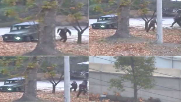 A North Korean soldier running from a jeep and then shot by North Korean soldiers in Panmunjom, North Korea as he flees for the South in November. 