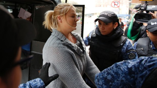 Cassandra Sainsbury arrives at court in Bogota in July.