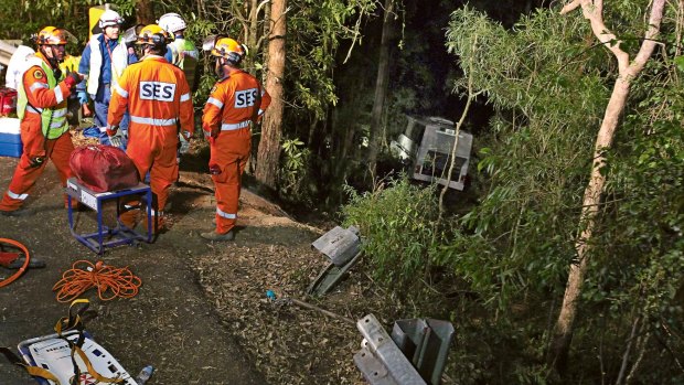 Emergency service workers at the scene of the bus crash near Kangaroo Valley.