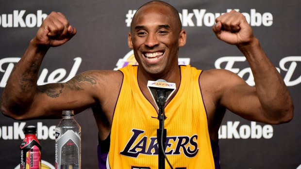 All over: Kobe Bryant smiles after scoring 60 points in the final game of his NBA career.