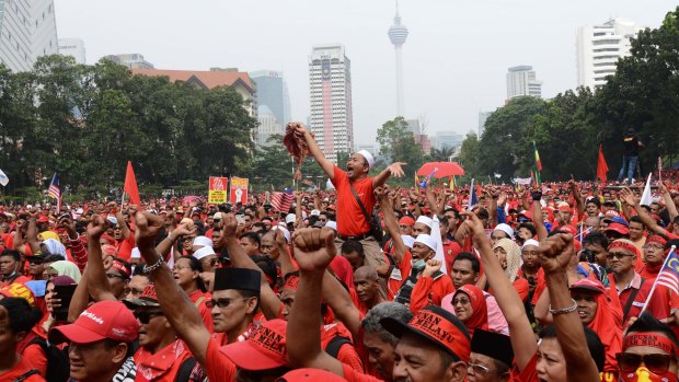 Ethnic Malays stage a rally in Kuala Lumpur to uphold Malay dominance and support Prime Minister Najib Razak's government.