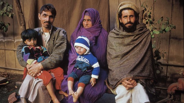 Sharbat Gula with her family in 2002. 