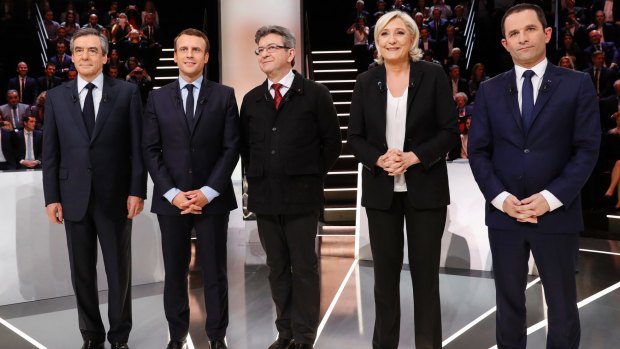 Candidates from left:Francois Fillon, Emmanuel Macron, Jean-Luc Melenchon, Marine Le Pen and Benoit Hamon pose before the debate.